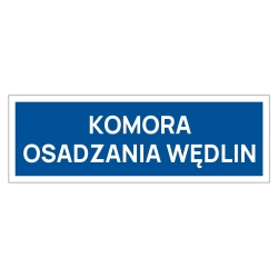 Tabliczka informacyjna na drzwi komory osadzania wędlin, wskazująca na miejsce przechowywania i dojrzewania wędlin